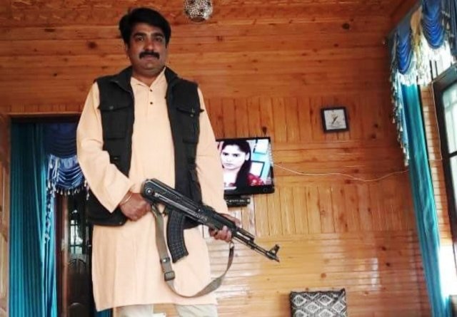 Jammu and Kashmir BJP leader Ashish Sareen viral AK-47 picture J&K BJP leader posts picture with AK-47 rifle on Facebook, party disowns him