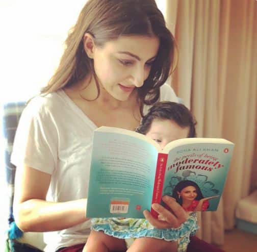 It is Soha's debut as a mother and also as an author. She shared this picture of her daughter Inaya with the advanced copy of the book, on social media. Image: Twitter