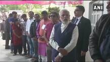 In Pics: When PM Modi reaches booth number 115 in Sabarmati\'s Ranip locality to cast his vote