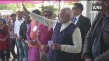 In Pics: When PM Modi reaches booth number 115 in Sabarmati\'s Ranip locality to cast his vote
