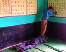 WATCH: Teacher from Madhya Pradesh caught on camera getting back massage from student in a govt school