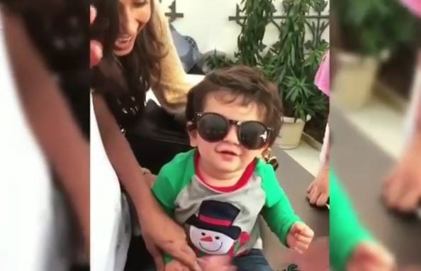 ADORABLE ! This VIDEO of Taimur wearing Kareena’s sunglasses is going viral ! ADORABLE ! This VIDEO of Taimur wearing Kareena's sunglasses is going viral !