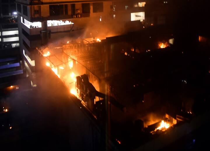 Graphic content / A general view of a building on fire where a rooftop party was being held in Mumbai early on December 29, 2017. PTI Photo