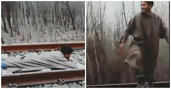 Kashmir Youth Lays Down Under Moving Train On Railways Track For A Stunt Careless Much? Kashmir Youth Lays Down Under Moving Train For A Stunt