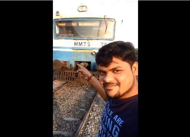 Man Gets Hit By Train As He Attempts A Stupid Selfie Stunt. Watch Disturbing Video Man Gets Hit By Train As He Attempts A Stupid Selfie Stunt. Watch Disturbing Video