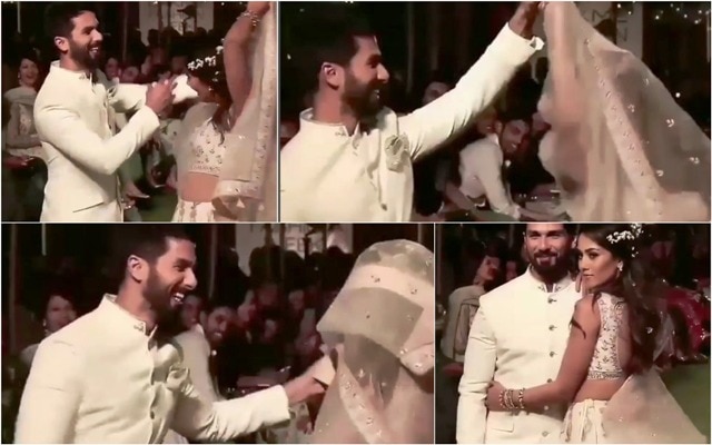 Bollywood actor Shahid Kapoor gets wife Mira Rajput all tangled up in her Dupatta at Lakme Fashion Week 2018 OOPS ! Shahid Kapoor gets wife Mira all tangled up at RAMP !