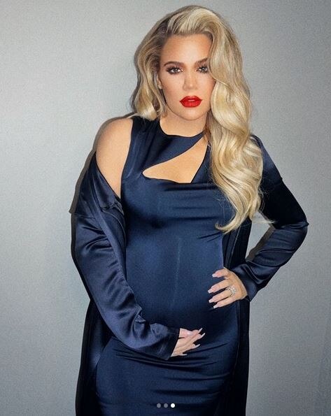 Khloé Kardashian flaunts baby bump