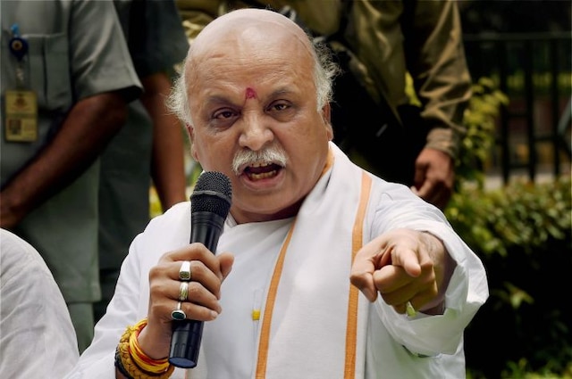 VHP Chief Pravin Togadia hits out at PM Modi, says 'People voted you for Ram Temple, not triple talaq law' VHP Chief Pravin Togadia hits out at PM Modi, says ‘People voted you for Ram Temple, not triple talaq law’