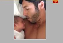 VIRAL SACH: Father stops crying baby by chanting \'Om\'?