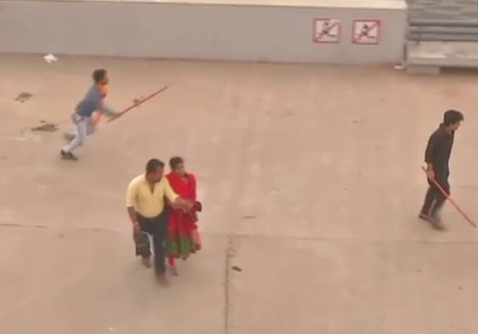 Members of Bajrang Dal harass couples at Sabarmati Riverfront in Ahmedabad. Later detained by police. (Image Courtesy -ANI)