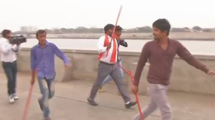 Members of Bajrang Dal harass couples at Sabarmati Riverfront in Ahmedabad. (Image Courtesy -ANI)