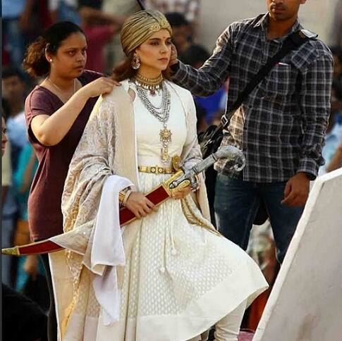 From Kangana launching the poster in style by doing Ganga Aarti to Kangana getting injured with a sword to being criticised by a group of people who claimed it distorts historical facts -- the film, which is being helmed by Krish, has grabbed headlines since its inception. (Image- Twitter)