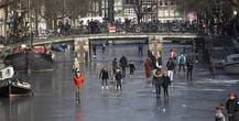Yes, It Really Happened! People In Amsterdam Are Ice Skating On Frozen Canals