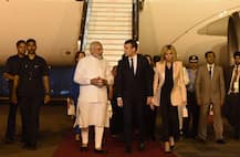 IN PICS: This Is How PM Modi Broke Protocol To Receive France\'s President Emmanuel Macron