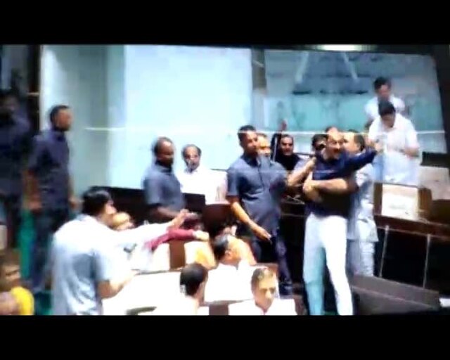 BJP MLA Jagdish Panchal gets 'belted' by Congress MLA Pratap Dudhat inside Gujarat Assembly Congress MLA beats BJP legislator with belt inside Gujarat Assembly