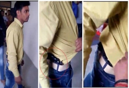 Agra: During exam, while students cheat man carries pistol in hall Agra: During exam, while students cheat, examiner carries pistol in hall