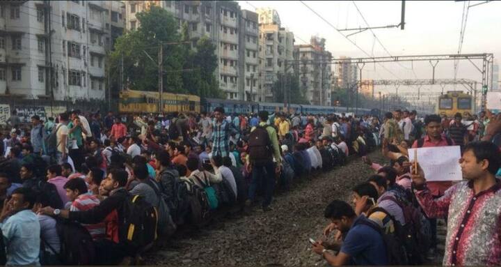 The students blocked the rail track at 7 am in the morning, forcing railway to stop the suburban as well as express train in the affected section between Matunga and CSMT. (All Images Twitter)