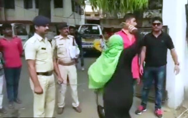 WATCH: Mother of rape victim thrashed accused while he was in police custody in Indore WATCH: Mother of rape victim thrashed accused while he was in police custody in Indore