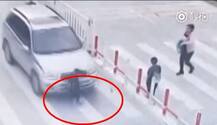 Bizarre ! Child gets hit by car while crossing street, mother remains busy on phone