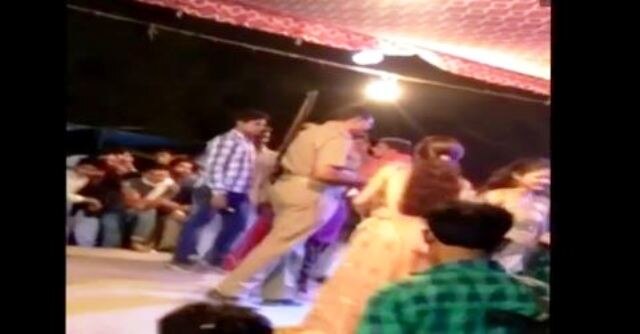 WATCH VIDEO: Police personnel throws currency notes at dancers in Unnao, Uttar Pradesh WATCH VIDEO: Police personnel throws currency notes at dancers in Unnao, Uttar Pradesh