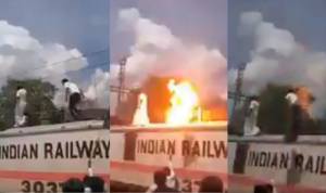 VIDEO: Man gets electrocuted on top of train during Cauvery protest in Tamil Nadu