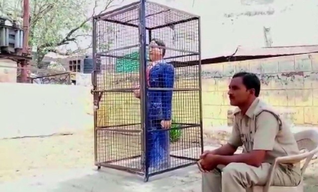 Ambedkar statue locked in iron cage in UP Ambedkar statue locked in iron cage in UP