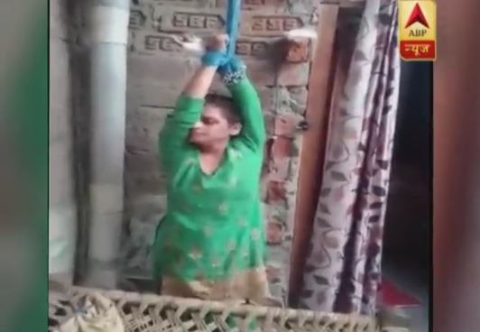 Watch: For dowry, husband ties wife with rope, thrashes her, sends video to in-laws Watch: For dowry, husband ties wife with rope, thrashes her & sends video to in-laws