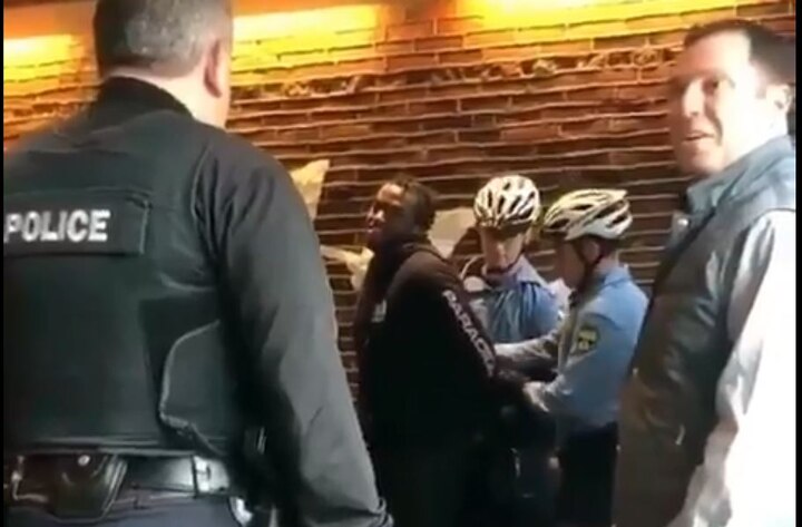 Video of black men being handcuffed at Starbucks goes viral; CEO apologises Video of black men being handcuffed at Starbucks goes viral; CEO apologises
