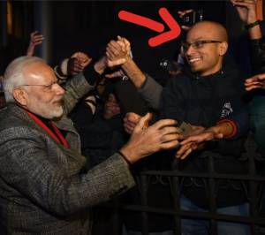 Twitter is split on this man’s identity who shook hand with PM Modi