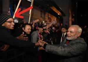 Twitter is split on this man’s identity who shook hand with PM Modi