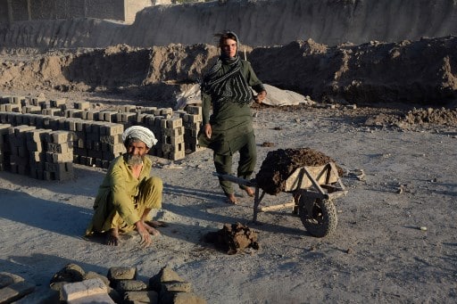Most of the girls stop dressing as boys after reaching puberty, but Sitara continued to guise as a boy to avoid risks and to protect herself at the brick factory. She attends funerals too as the eldest son of his father, something she would never be allowed to do as a girl/ /Image Courtesy: AFP PHOTO / Noorullah SHIRZADA