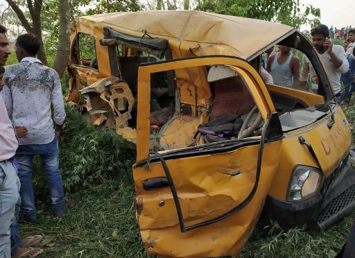 13 children, 1 driver killed as school van collides with moving train in Kushinagar, UP Kushinagar: 13 kids killed as driver wearing earphones rams van into moving train