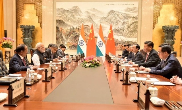 Modi in China: PM invites Chinese President Xi Jinping to India for informal summit in 2019 Modi in China: PM invites Chinese President Xi to India for informal summit in 2019