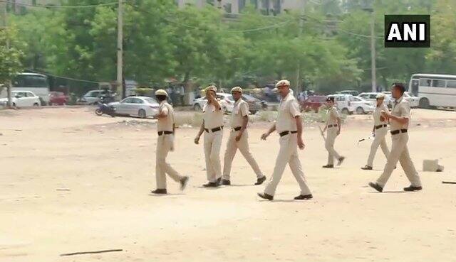 On April 20, six people were arrested for disturbing namaz in Gurugram as Sanyukt Hindu Sangharsh Samiti has called for a ban on namaz in open spaces. Picture of policemen at an open plot where Namaaz will be read. (ANI).