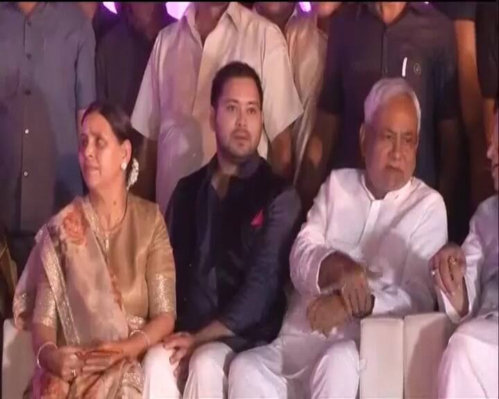 Nitish Kumar sits with Lalu's son Tejashwi and former Bihar CM Rabri Devi.