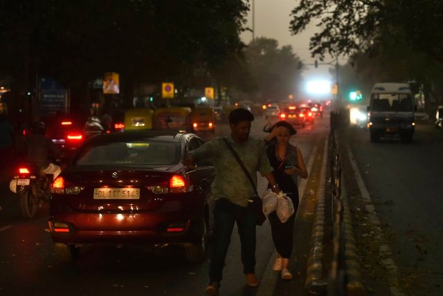 Thunderstorm alert: Dust storm, light rain hit Delhi-NCR Intense dust storm uproots trees in Delhi-NCR, disrupts traffic and flight movement