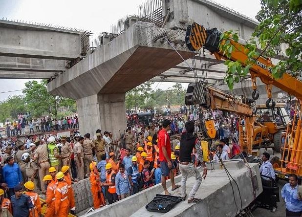 18 killed in Varanasi flyover collapse, four officials suspended 18 killed in Varanasi flyover collapse, four officials suspended