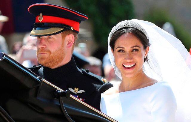 His ring was a platinum band with a textured finish and Markle's was made from a piece of Welsh gold. Prince Harry, flanked by his brother and best man Prince William, was dressed in the frockcoat uniform of the Blues and Royals. (Photo: AP)