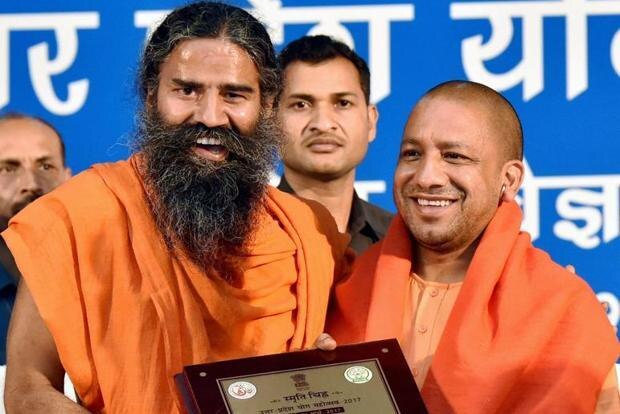 Patanjali food park row: Ramdev meets Yogi, decides to move project to different location Patanjali food park to remain in UP itself, CM Yogi Adityanath assures Baba Ramdev