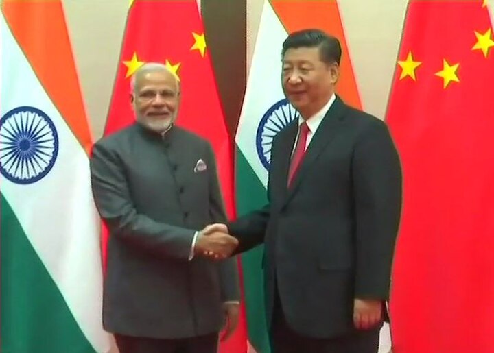 PM Modi arrives in China to attend SCO summit, meets Chinese President Xi PM Modi arrives in China to attend SCO Summit, meets Chinese President Xi