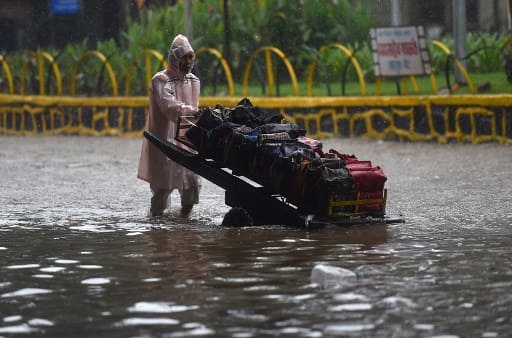 IN PICS: Monsoon Rain Arrives In Mumbai With Heavy Showers IN PICS: Monsoon Rain Arrives In Mumbai With Heavy Showers