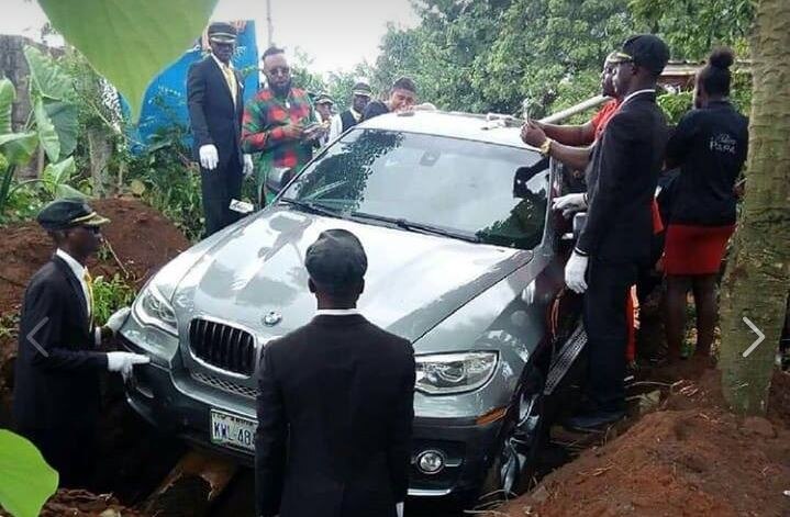 BIZARRE! Nigerian man buries father in brand-new BMW BIZARRE! Nigerian man buries father in brand-new BMW