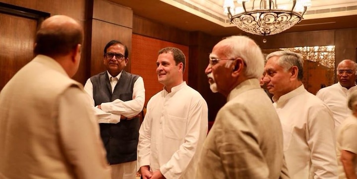 Rahul hosts first Iftar as Cong President, removes skullcap offered by workers within seconds Rahul Gandhi hosts Iftar, removes skullcap offered by workers within seconds