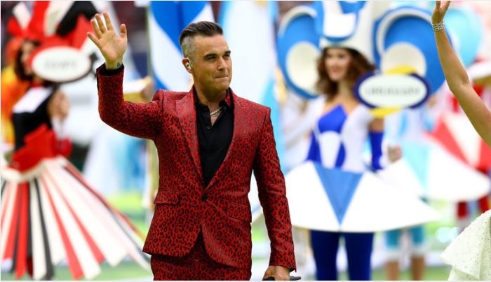 Robbie Williams' inappropriate gesture forces US broadcaster to apologise Robbie Williams' inappropriate gesture forces US broadcaster to apologise