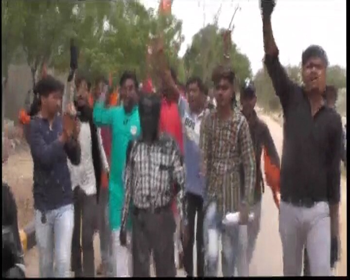 Kutch Univ: ABVP members make professor parade after smearing irritant black substance on his face ABVP members make professor parade after smearing him with irritant black substance