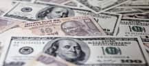 Rupee slides to record low against US Dollar, falls sharply at 69