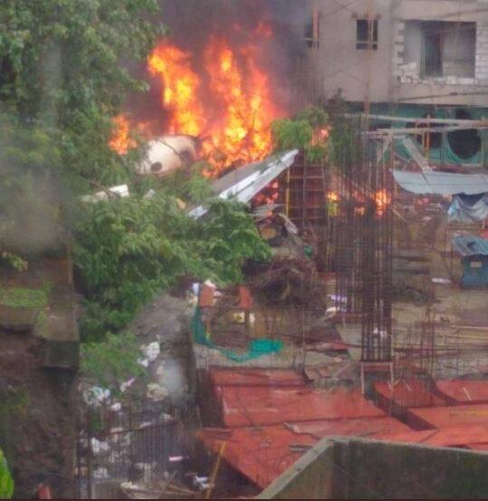 A loud explosion was heard and the plane and surrounding areas instantly caught fire after the crash. Image: ANI