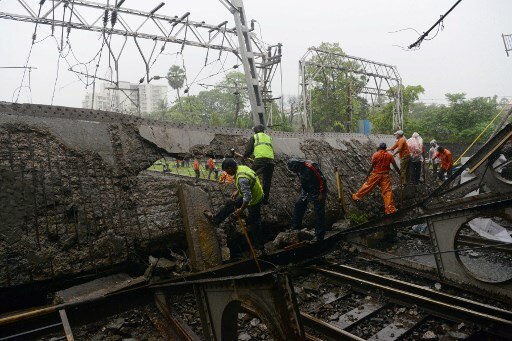 Mumbai: Roadover bridge collapses on railway tracks near Andheri Station latest update Mumbai bridge collapse: Local train services hit, 5 hurt; Railway minister orders probe