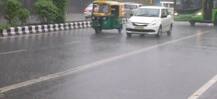 It\'s raining in Delhi! Pleasant weather dips temperature; SEE PICS