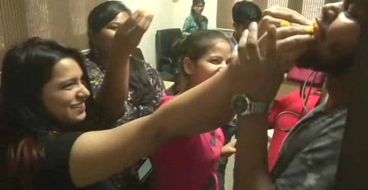 Aam Aadmi Party(AAP) workers celebrated the Supreme Court's verdict at office in Delhi on Wednesday. (ANI)
